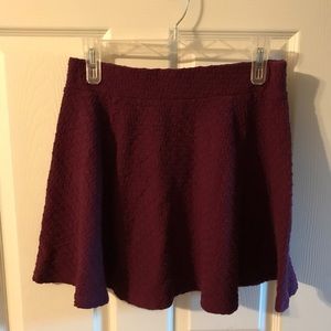 Deep purple mid thigh skirt M